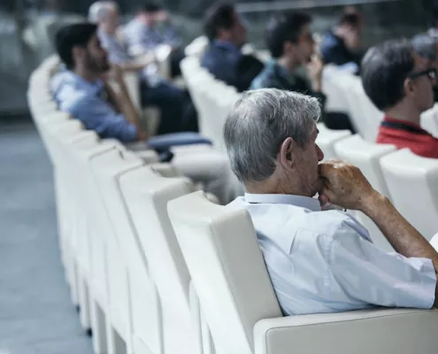 Immobilienverwalter in einer Konferenz